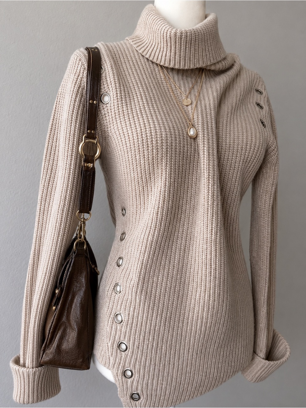 Generation Love Ribbed Grommet-Accent Turtleneck Sweater in Beige